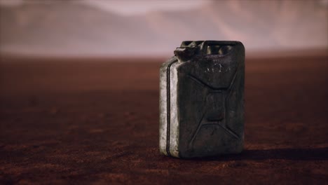 old rusty fuel canister in the desert