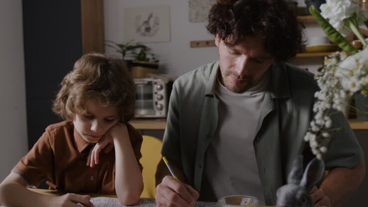 Father and Son Coloring Together