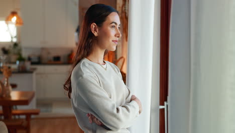 woman looking out the window