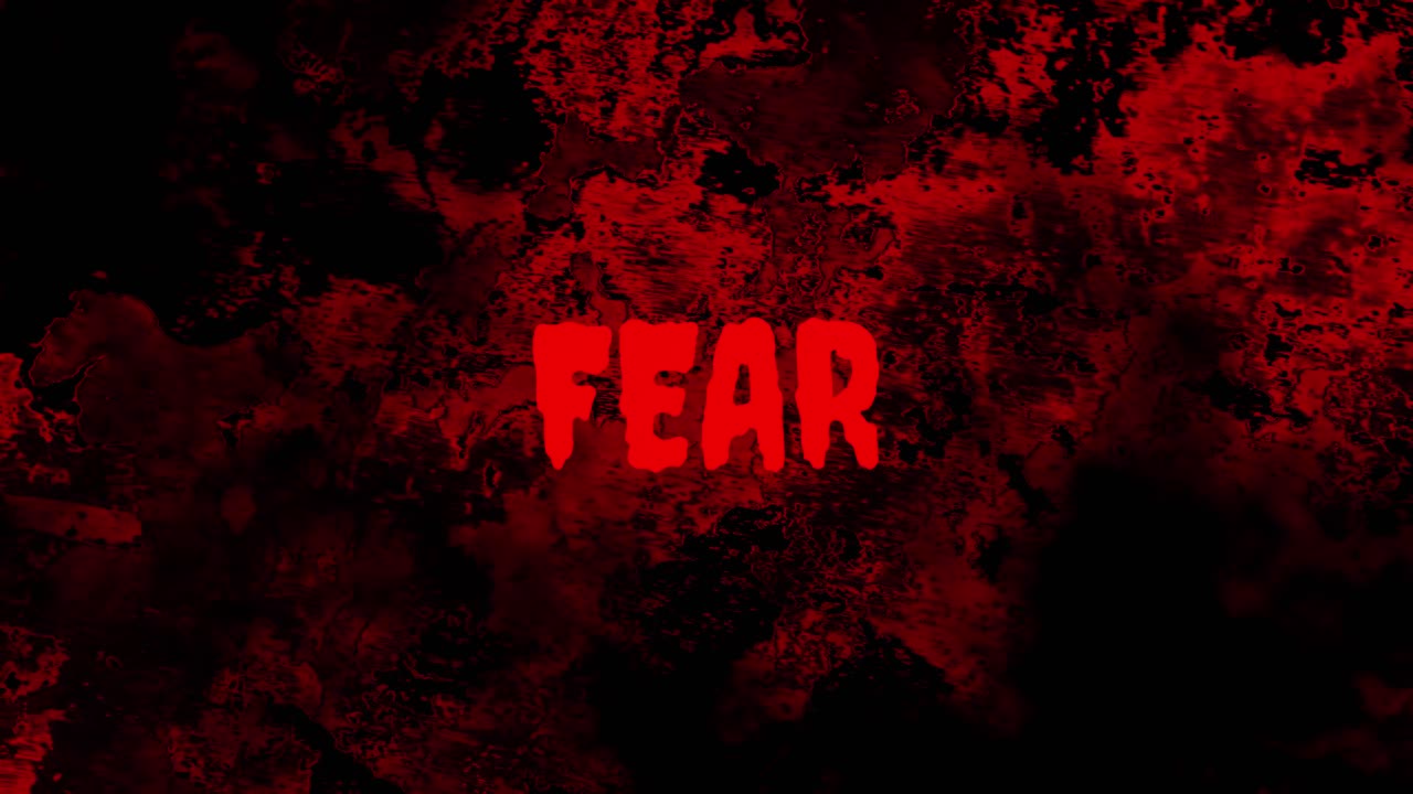Pulsating Red Fear Text on Dark Grunge Background