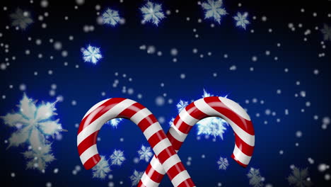 candy cane icon over snowflakes floating and white spots falling against blue background