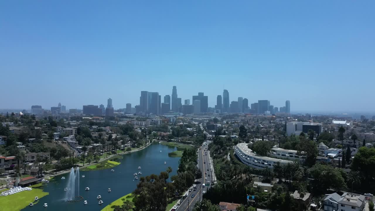 Cinematic 4K drone shot tilting down to reveal the Los Angeles skyline in daylight. Slow motion capable, ideal for urban, travel, lifestyle, or commercial projects