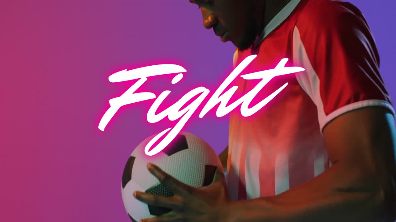 Holding soccer ball, person in red sports jersey with Fight animation overlay