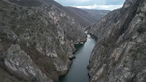 Aerial-view-Lake-Matka-near-Skopje,-Macedonia,-is-situated-in-a-canyon,-Man-made-with-a-dam-at-the-end