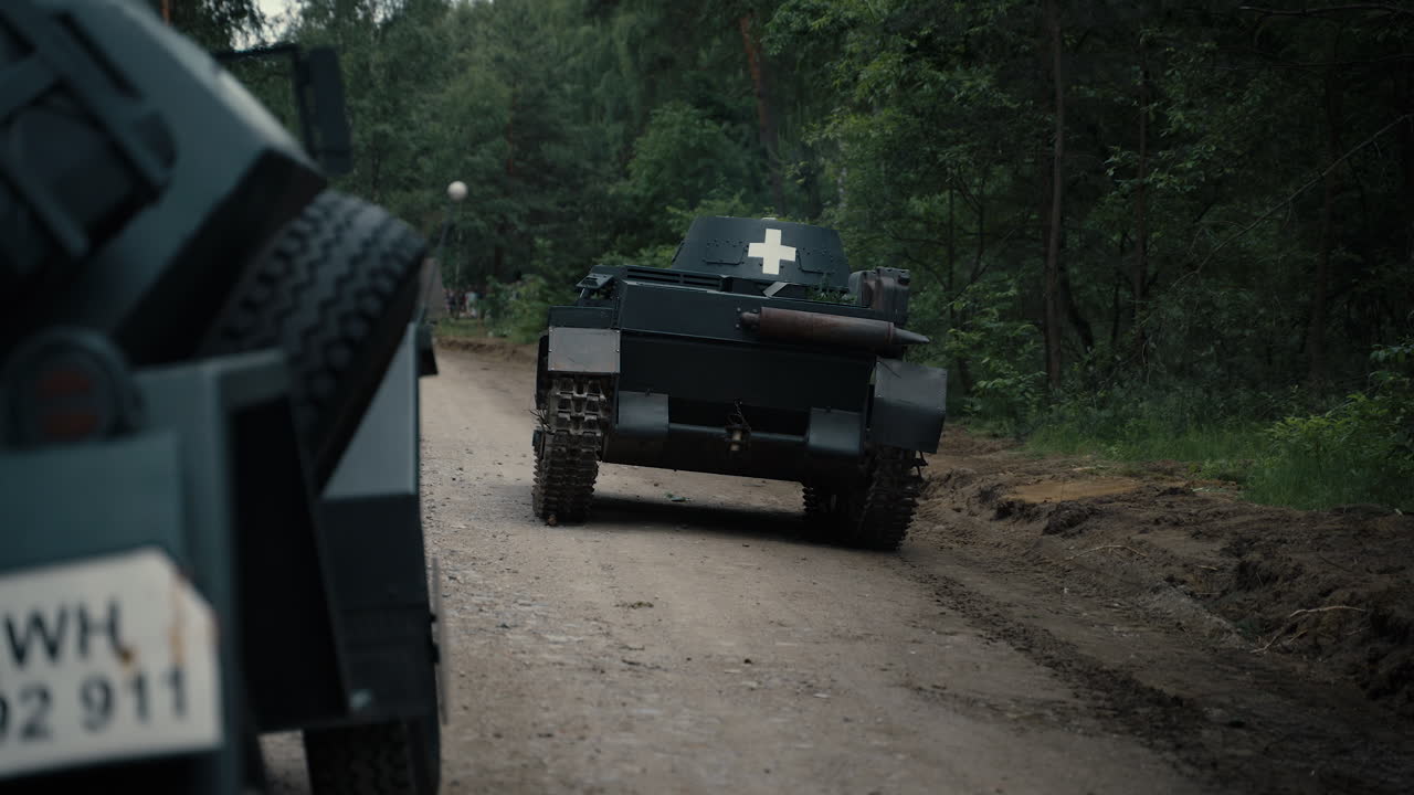 World War II Military Vehicle on a Dirt Road