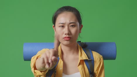 woman rejecting with finger gesture