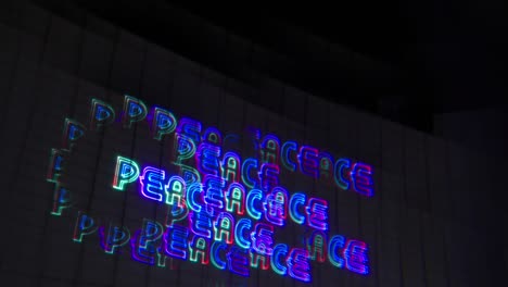 hallucinogenic positive messages of peace, love, and unity were projected onto a wall of an art gallery positive aura booster progressive psytrance psybient vibrations kaleidoscope visuals