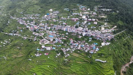 the aerial view shows the mountain village of dhunche bazar in the hill station of rasuwa, nepal