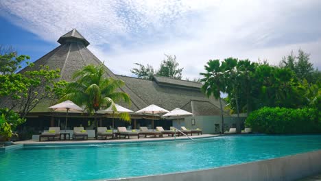 wide shot of tropical luxury beach resort at the seaside