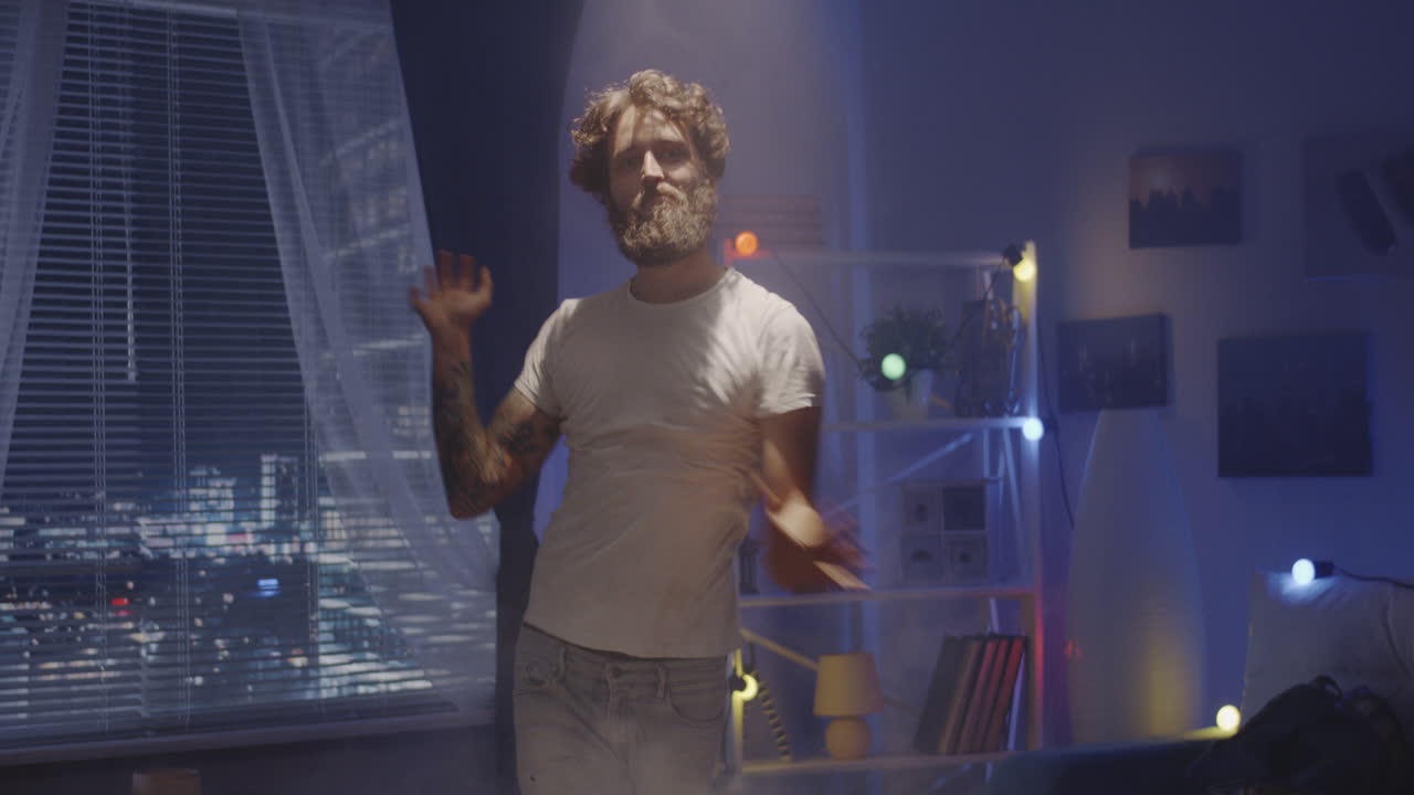 Man Dancing in a Night Room