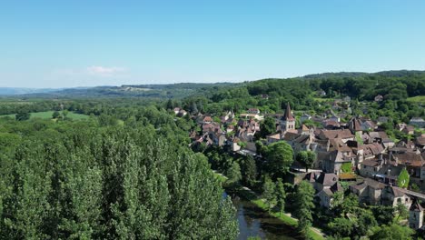 drone reveal shot carennac village in dordogne valley france drone , aerial, 4k footage