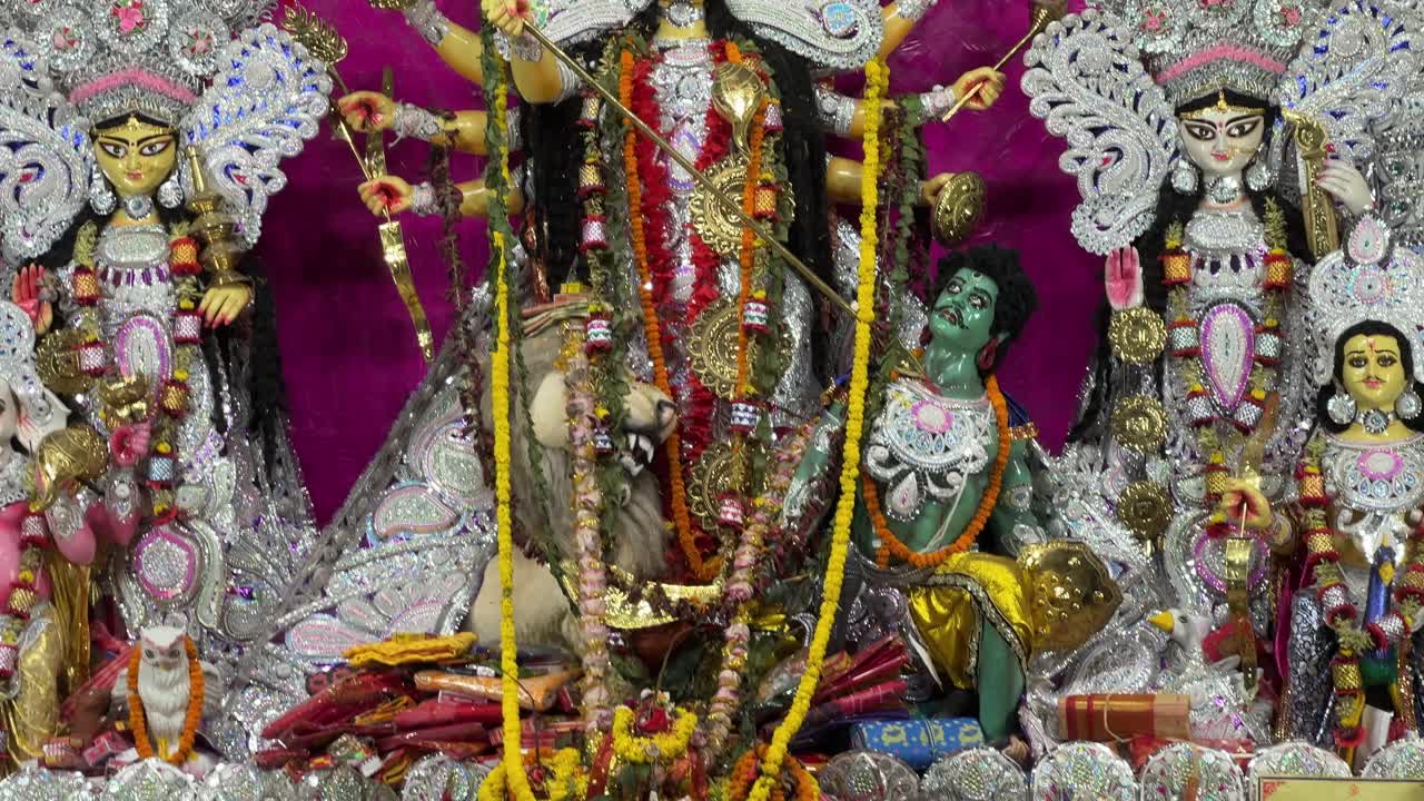 Close up shot of Goddess Durga Maa dressed in traditional Daker saj in Kolkata