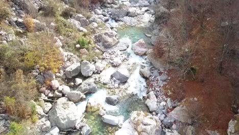 flowing river in theth valley during fall season in albania at sunrise