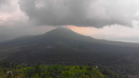 aerial shot of the batur volcano on the bali island, indonesia. with a speed ramp effect