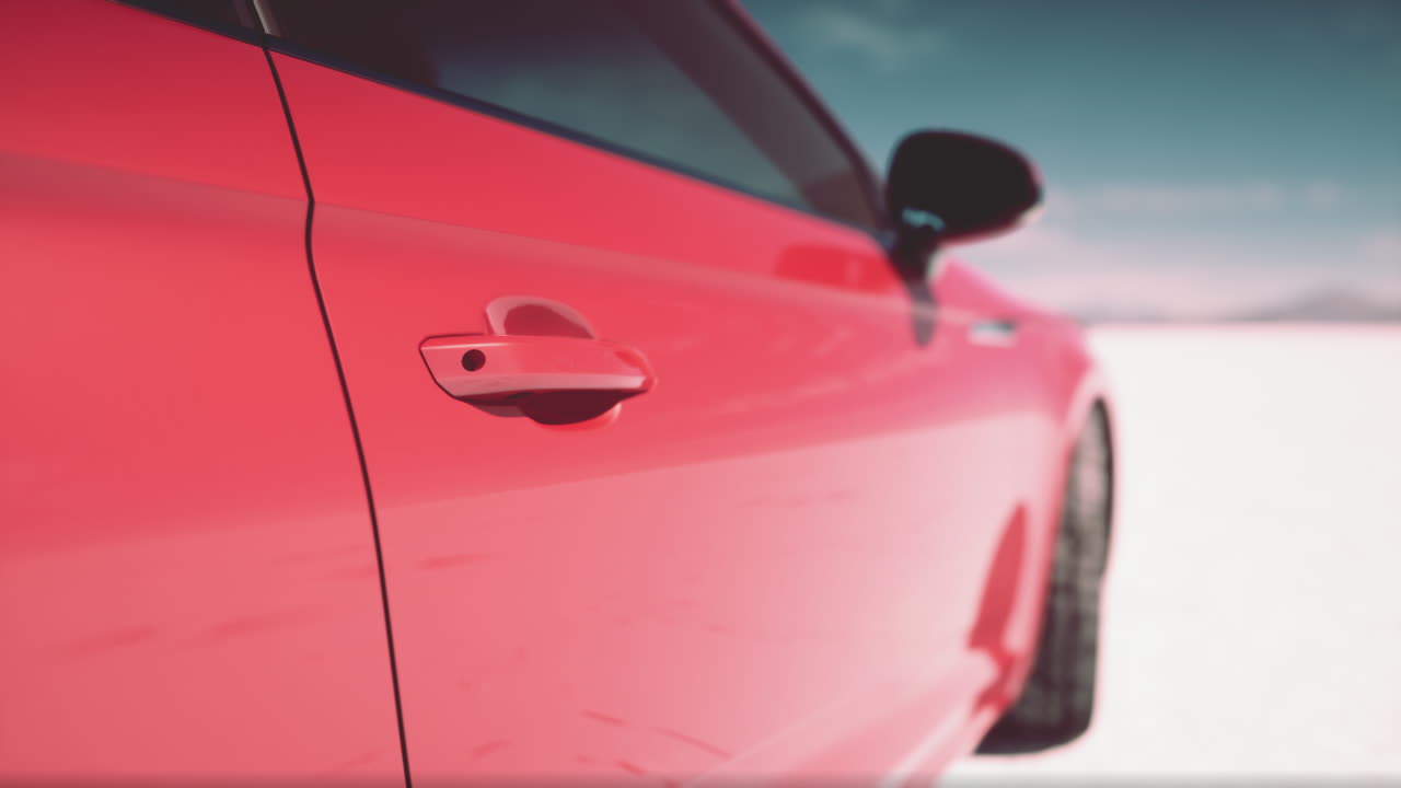 la manija roja de la puerta del coche en un paisaje desértico nevado