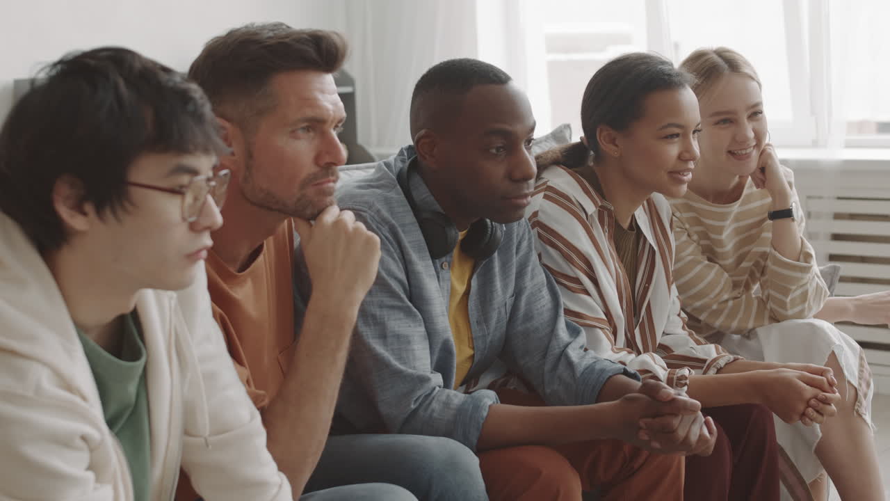 Women and Men Sitting Together