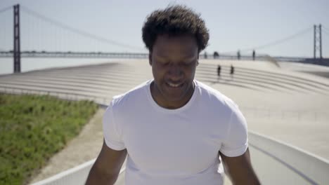 closeup shot of african american man skipping rope outdoor.