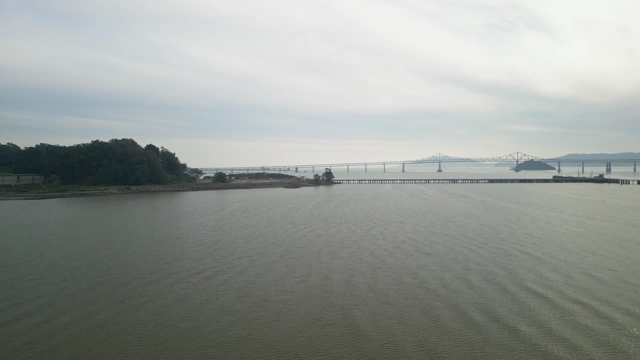 Aerial slow tracking right of Richmond Bridge from Point Molate Beach Richmond California USA