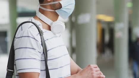 Side-view-of-Caucasian-man-wearing-a-coronavirus-Covid19-mask