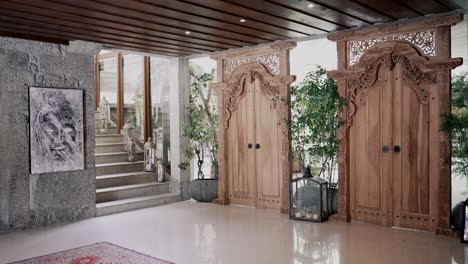 puertas de madera ornamentadas y entrada moderna