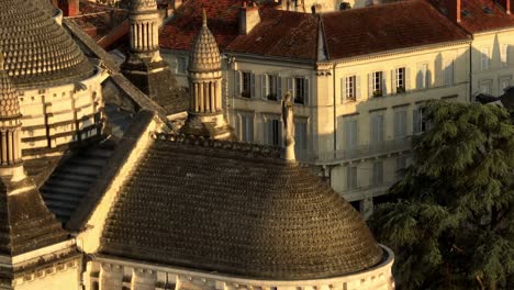 Close-up-aerial-view-of-a-statue-representing-a-woman-or-a-saint-at-Saint-Front-Cathedral-in-Périgueux,-Dordogne