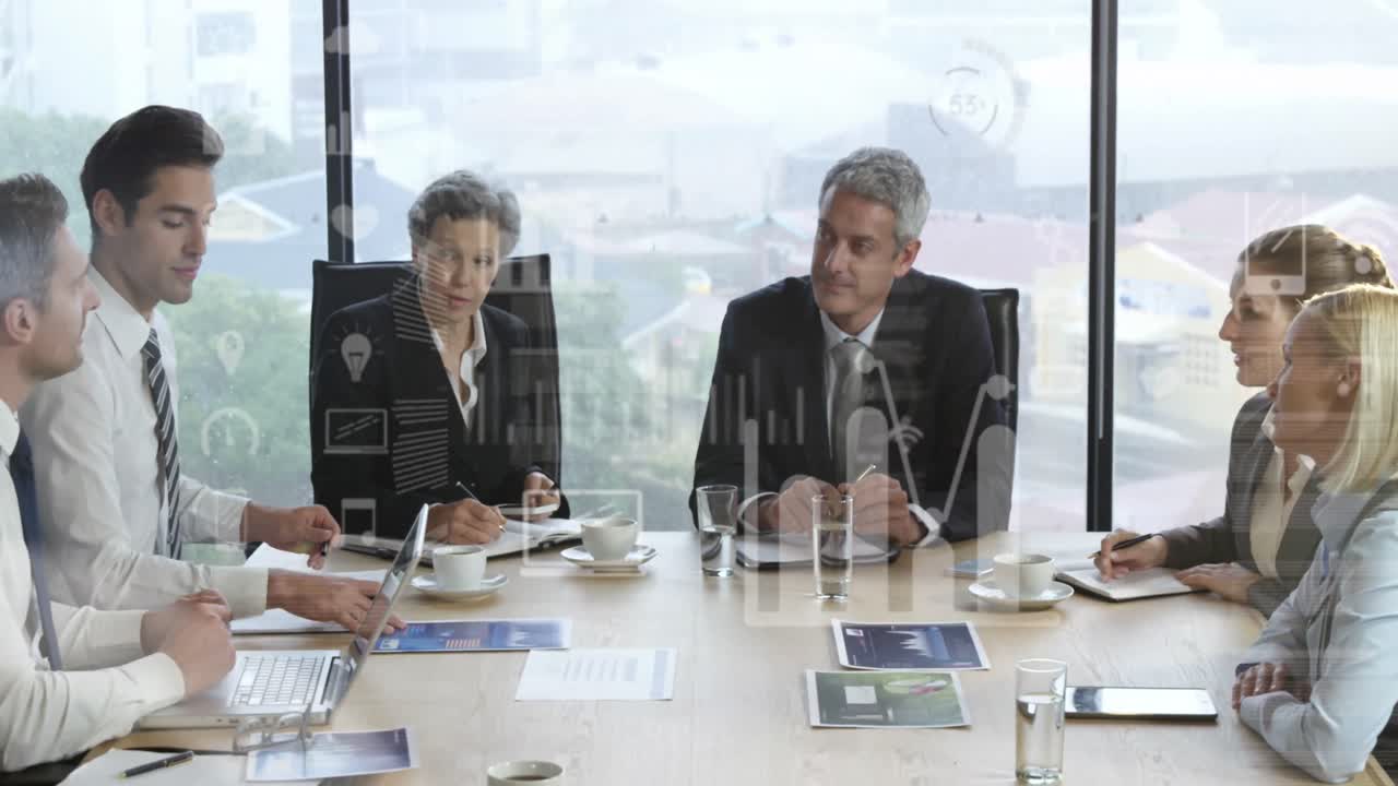 Animation of statistical data processing over diverse businesspeople discussing together at office
