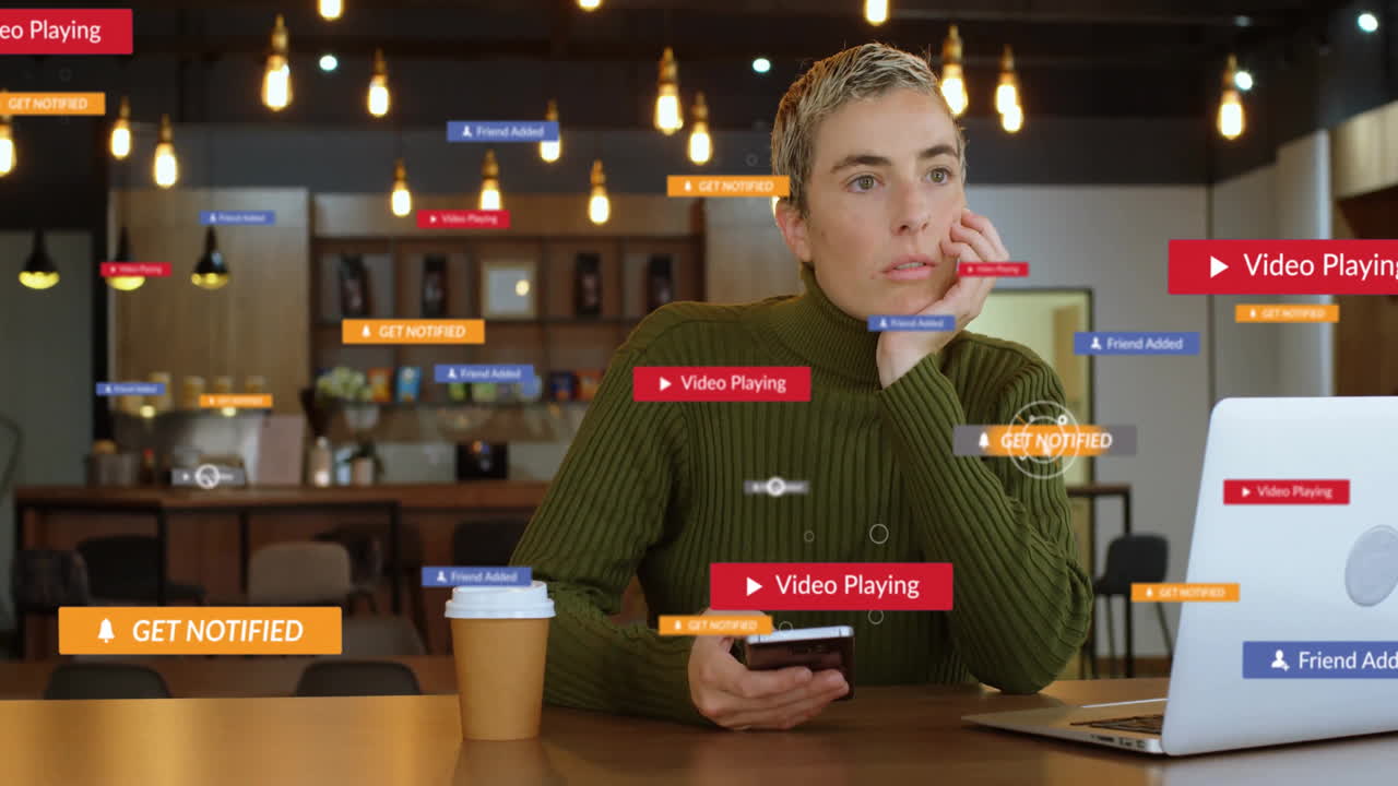 Person holding phone at cafe, surrounded by digital notification animations