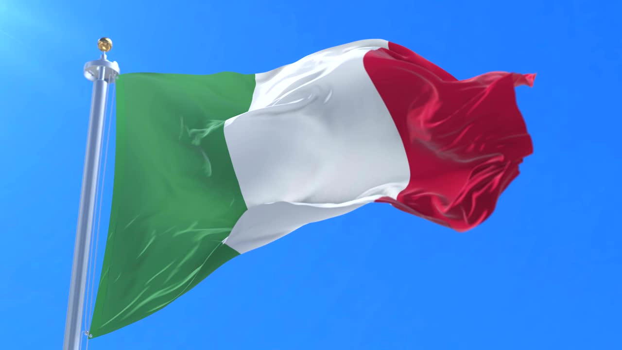Bandiera dell'Italia che sventola al vento con cielo blu, in loop.