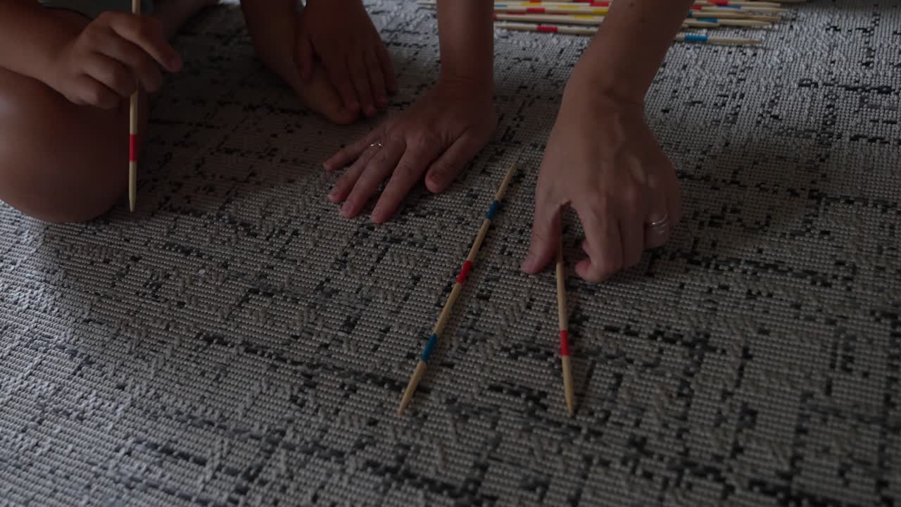 Playing Pick-Up Sticks on the Carpet