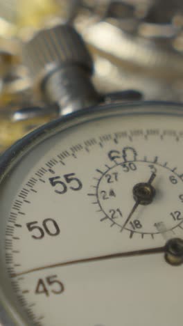 bitcoin and analogue metal stopwatch