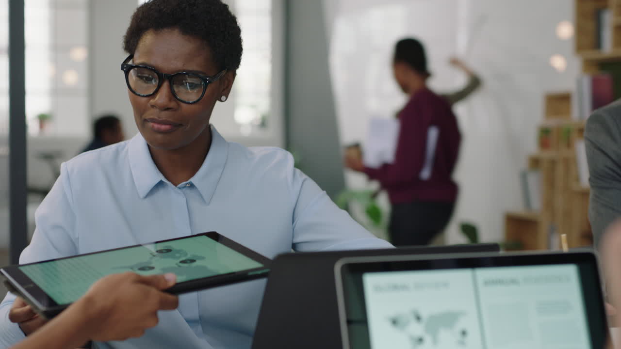 business people meeting team leader businessman using digital tablet computer showing marketing project presenting information diverse management group collaborating in office brainstorming