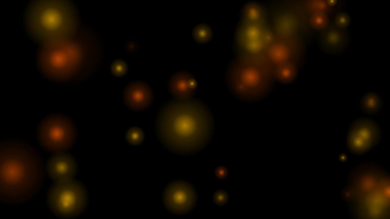 Floating Golden Bokeh Particles on Black Background