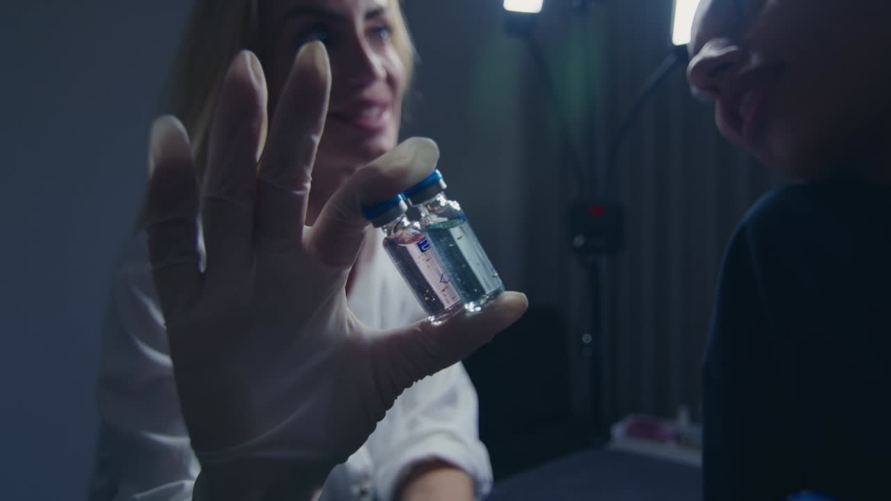 Medical Professionals Examining Small Vials