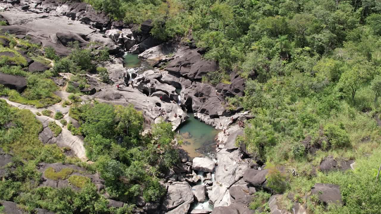 aerial view of Vale da Lua in Chapada dos Veadeiros National Park Goi&aacute;s Brazil sunny day, waterfall, rocks and cerrado vegetation