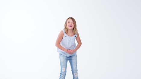 Young-Girl-Dancing-Against-White-Background-In-Slow-Motion