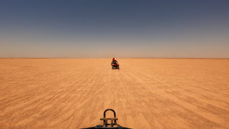 off-road quad bikes safari in a clean desert in egypt near hurghada, horizon view