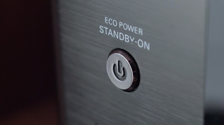 Pressing Stand By Power Button Close-Up