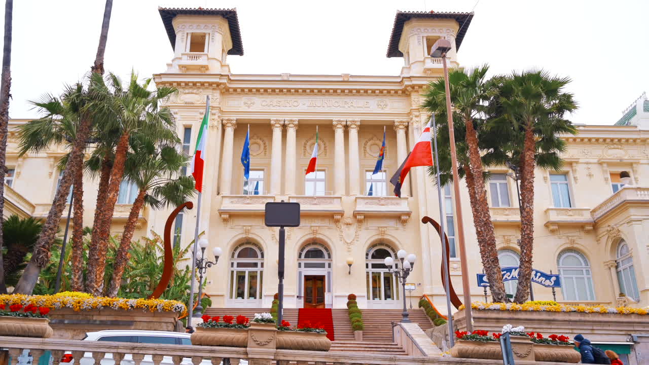 SANREMO, ITALY - MAY, 2022: Municipal Casino entrance with stairs and flags
