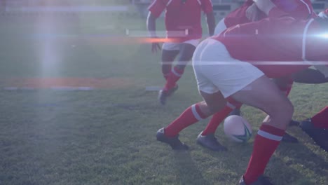 animation of glowing lights over diverse rugby players in sports stadium