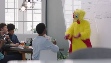 dancing chicken happy business people enjoying funny dance party in boardroom meeting celebrating successful victory crazy rooster high five colleagues excited office presentation