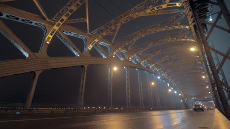 in saint-petersburg russia in evening on a busy bridge passing cars