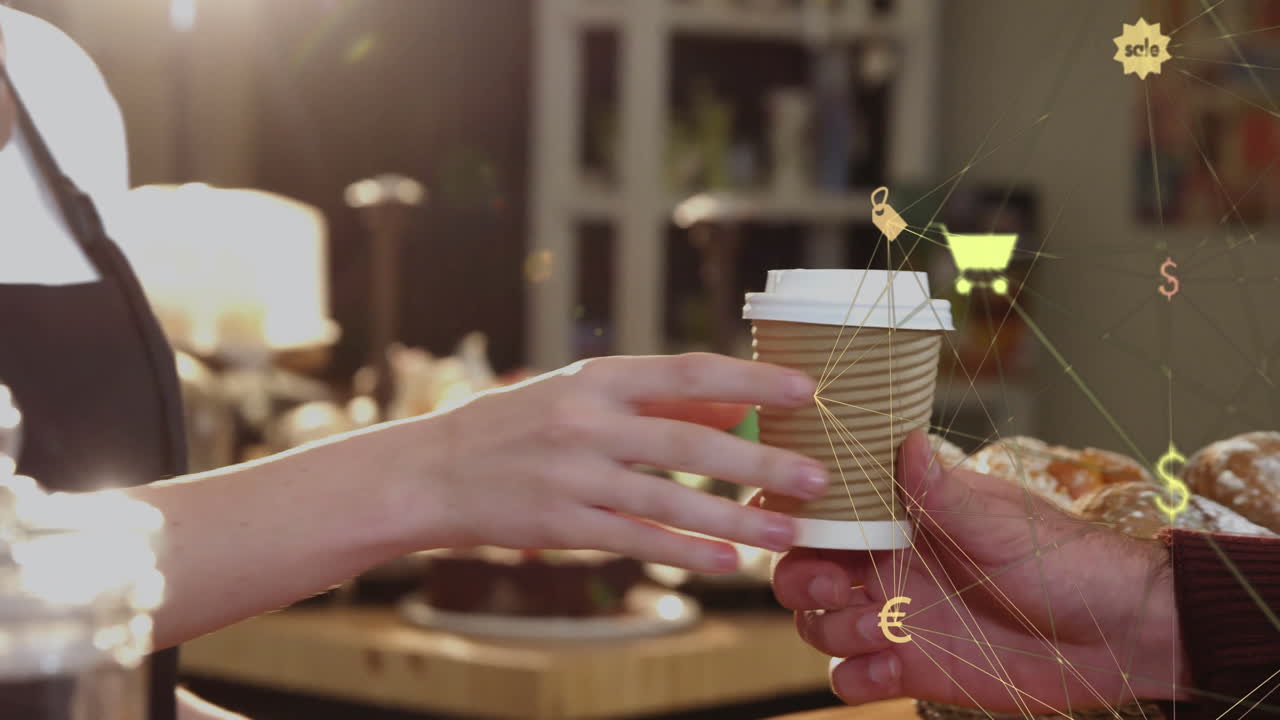 Handing to-go coffee cup with ribbed sleeve across cafe counter, featuring floating sale icons