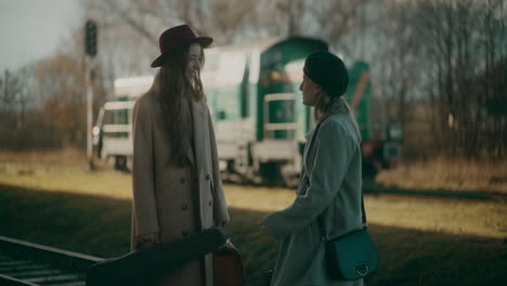 Two-Women-Talking-Outdoors