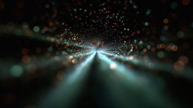 Un affascinante viaggio visivo attraverso un vortice cosmico di luce e colore, dove particelle luminose danzano e si uniscono in una straordinaria rappresentazione di profondità spaziale.