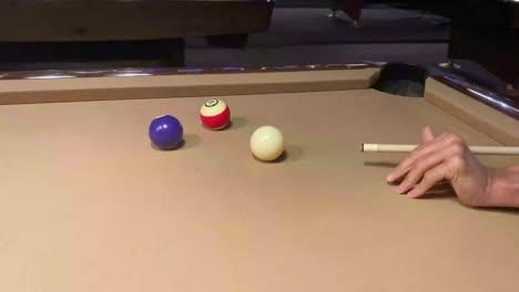 man playing pool 8 ball