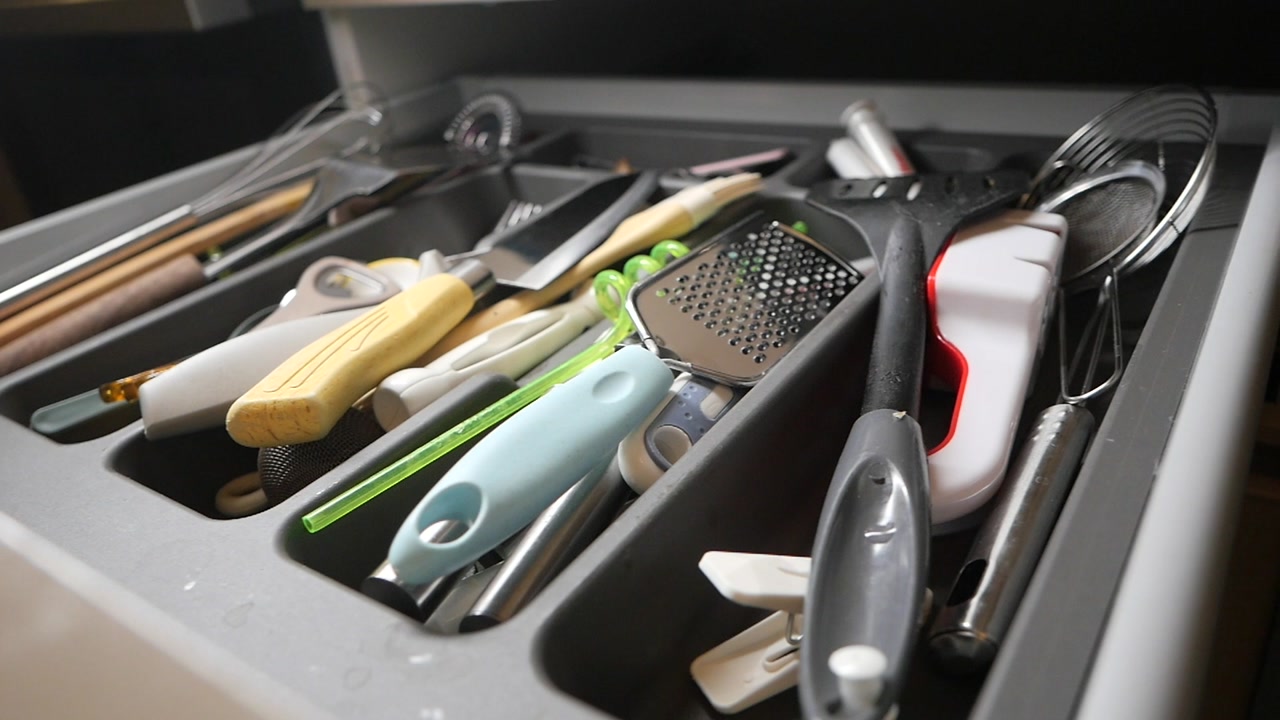 Close-up of an Organized Kitchen Drawer Filled with Utensils
