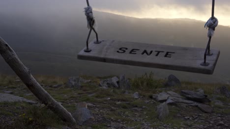 swing baloico in lousa mountain, portugal at sunset