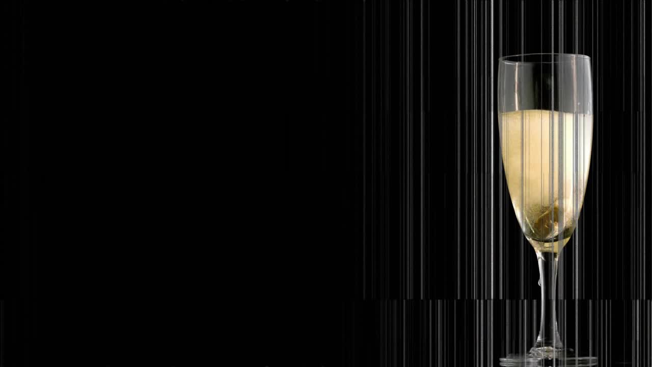 Champagne flute showing sloshing after tap, bubbles rising, scanlines crossing, settling