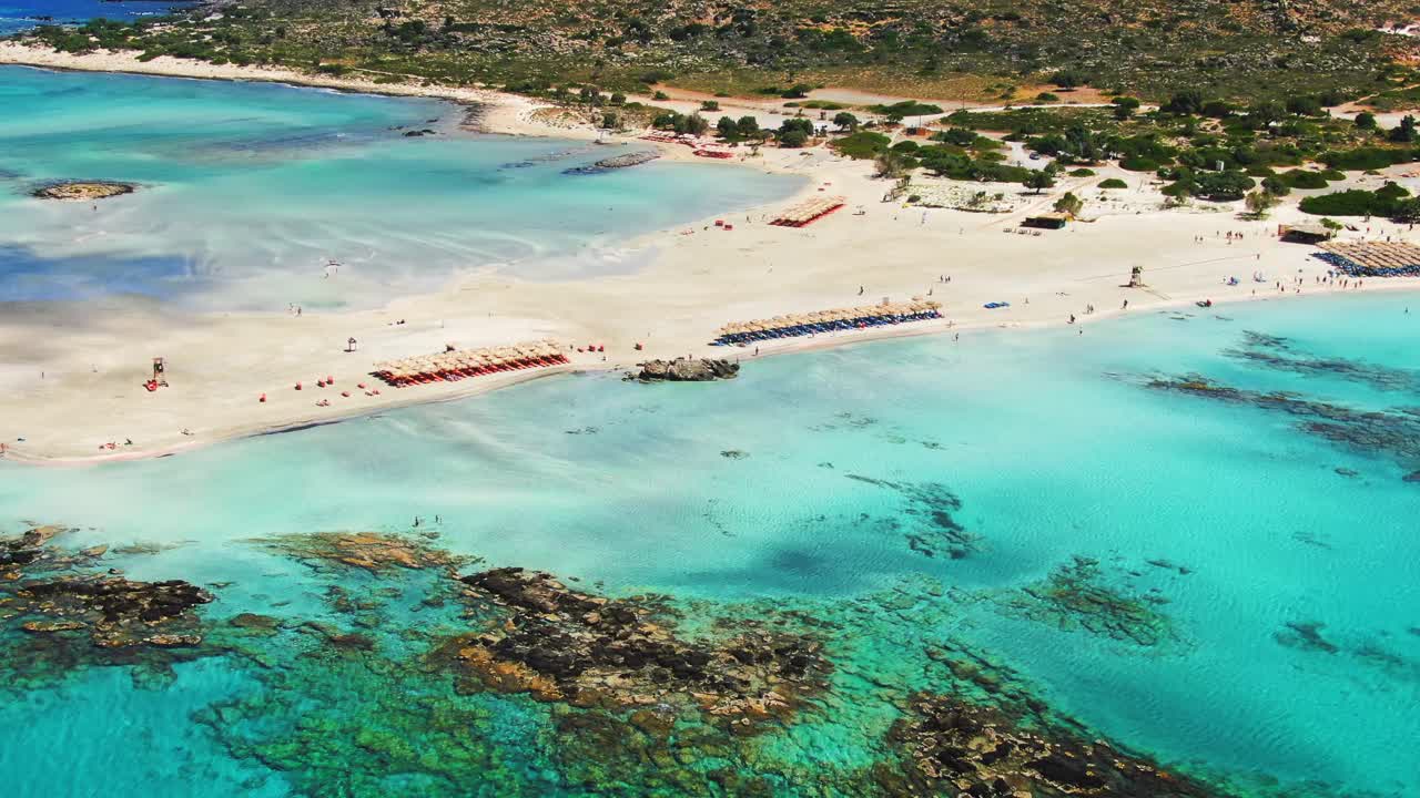 Beautiful white sand beach of Elafonissi. Surrounded by turquoise waters. Crete, Greece