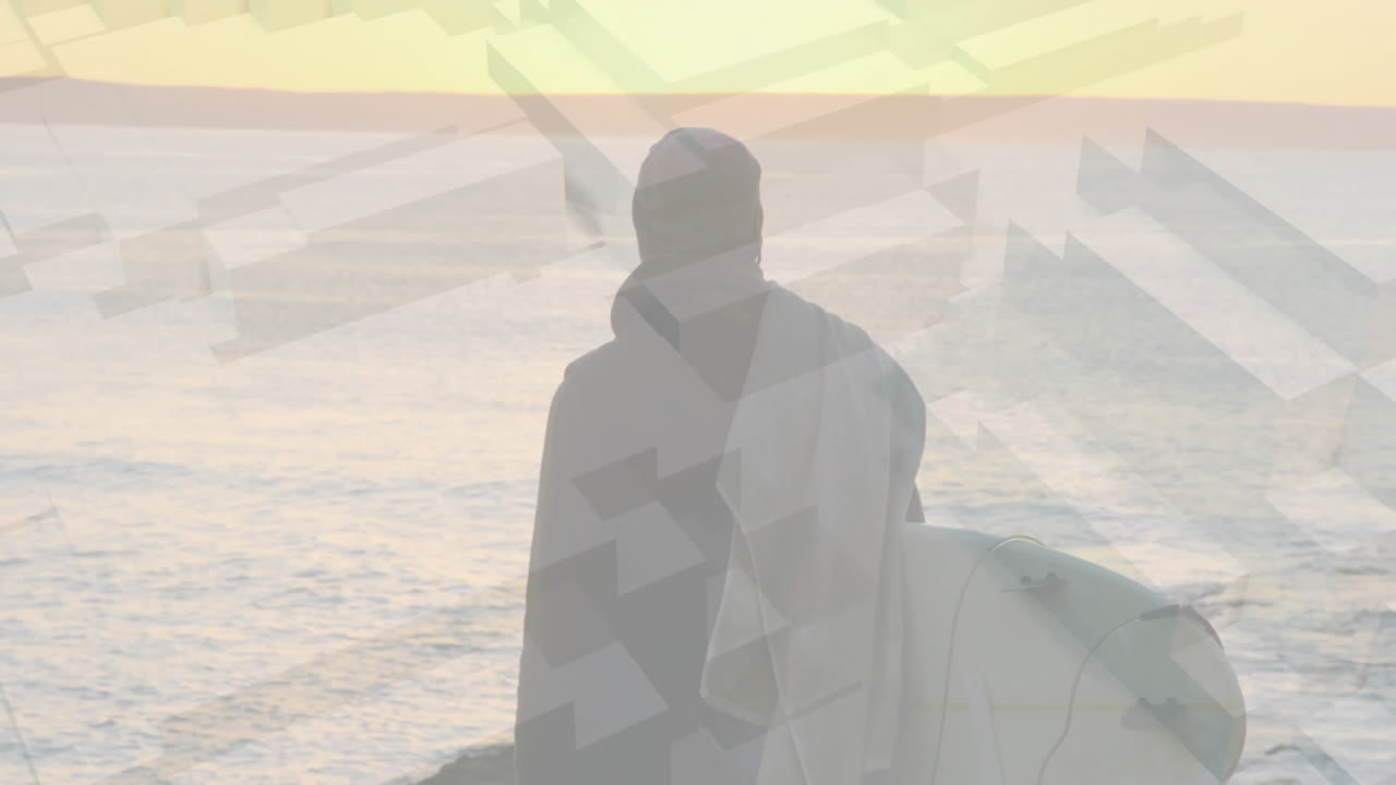 Holding surfboard at sunset with animation of geometric shapes overlay